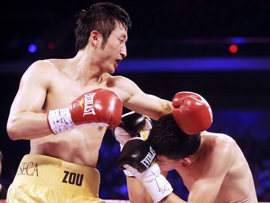 Zou Shiming wins debut pro fight