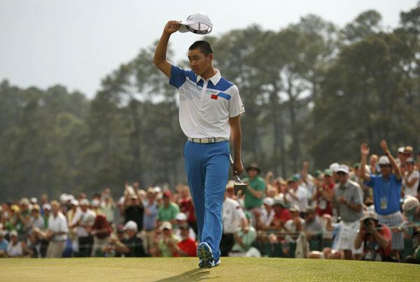 Guan fires 73 in historic Masters debut