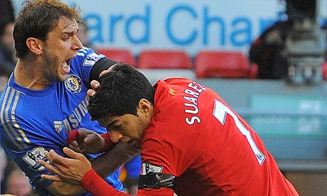 Suarez charged by FA over biting incident