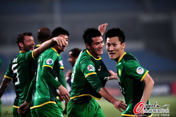 Historical win moves Guoan closer to last 16